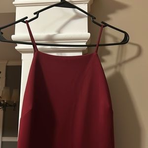 Dark red party dress very beautiful with some ruffles on side medium size.